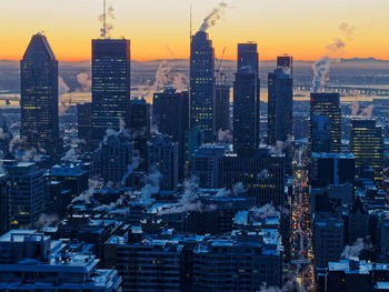 Aerial view of city at sunset