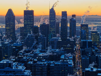 Aerial view of city at sunset