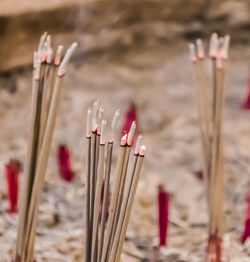 Close-up of cross against temple