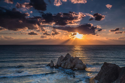 Scenic view of sea at sunset