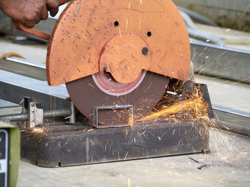 Close-up of man working in factory