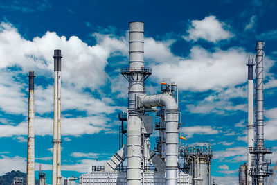 Oil and gas industrial zone,the equipment of oil refining,close-up of industrial pipelines.