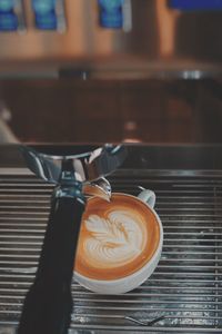 Coffee cup on espresso maker
