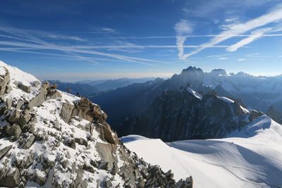 Scenic view of mountains against sky during winter