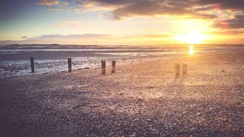 Scenic view of sea at sunset