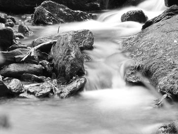 Close-up of water flowing through rocks