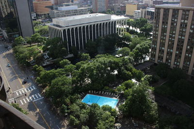 High angle view of street amidst buildings in city