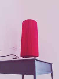 Low angle view of red wall