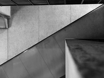 Escalator against wall at subway station