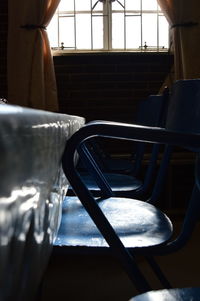 Empty seats seen through train window