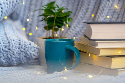 Stack of books on table at home