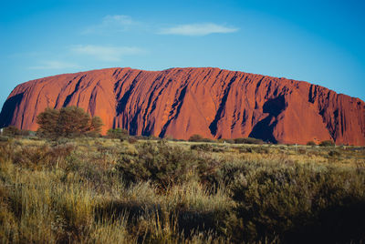 View of landscape against blue sky