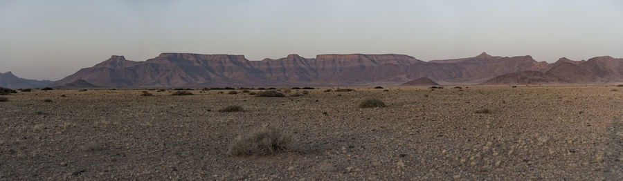 Scenic view of desert against sky