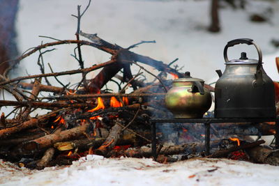 View of fire on log against sky