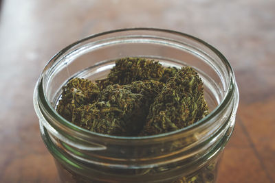 Close-up of glass jar on table