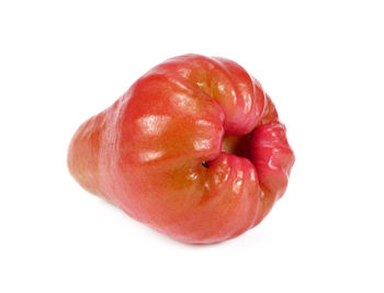 Close-up of apple against white background