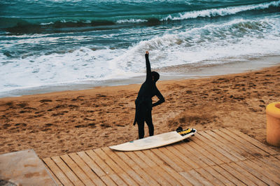 Full length of man on beach