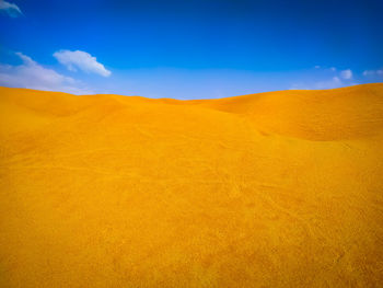 Scenic view of desert against sky