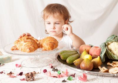 Close-up of child eating food