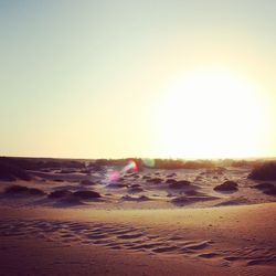 Scenic view of sunset over desert