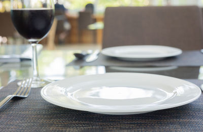 Close-up of wine in glass on table