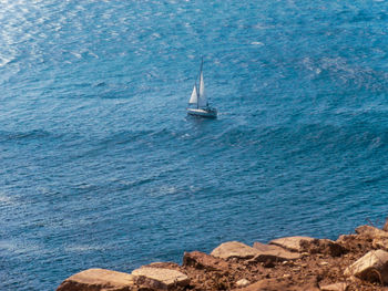 Sailboat sailing by the sea