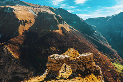 Scenic view of rock formation against sky