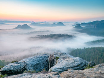 Popular kleiner winterberg view, beautiful misty valley in saxon switzerland, nature park in germany