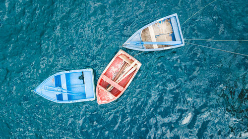 High angle view of boats floating on lake