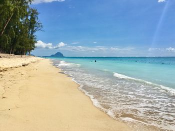 Scenic view of beach against sky