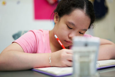 Young woman using mobile phone