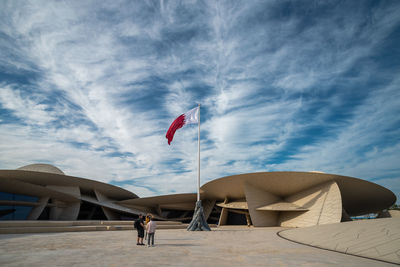 Flag on land against sky