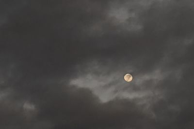 Low angle view of moon against sky