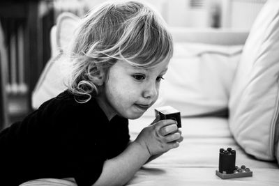 Portrait of a boy sitting at home