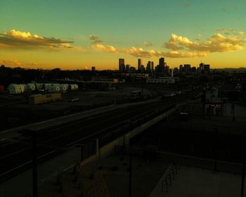 High angle view of city at sunset