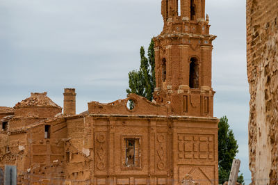 Low angle view of old building against sky