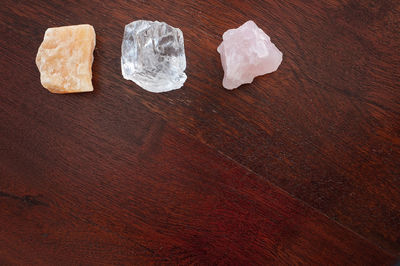 High angle view of rocks on wooden table