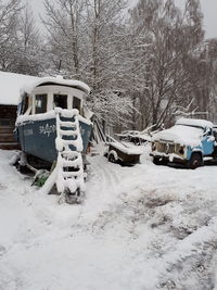 View of car on snow covered road