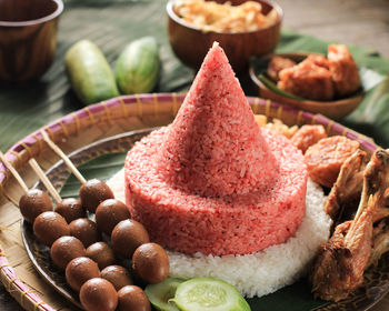 Red and white rice called nasi tumpeng same as indonesian national flag for independence day 