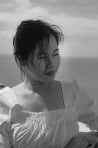 Portrait of girl on balcony at beach