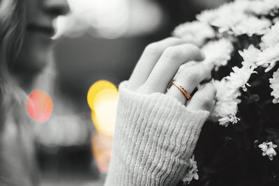 Close-up of human hand against blurred background