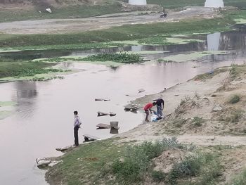 High angle view of people on lake