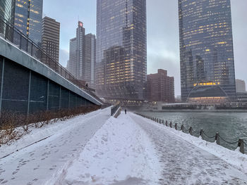 Modern buildings in city during winter