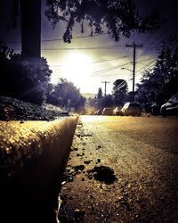 Surface level of road against sky in city