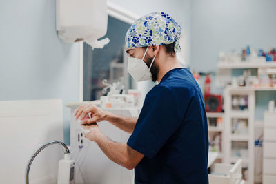 Side view of a man working