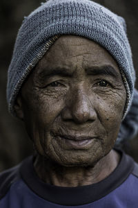 Close-up portrait of man wearing hat