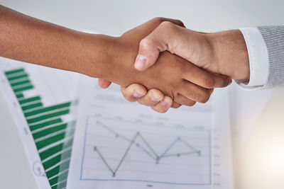 Cropped image of business colleagues shaking hands