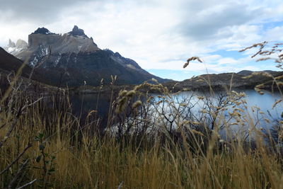 Scenic view of lake and mountain against sky