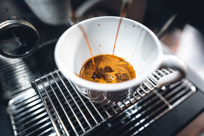 High angle view of coffee cup on table