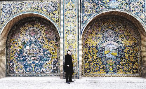 Man standing by golestan palace